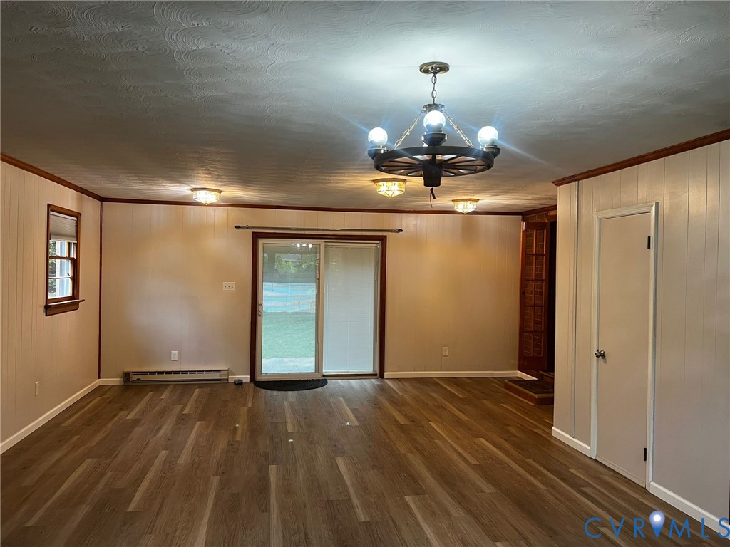 5325 Meadoway Road Richmond, VA 23234 - Photo 2 of 15 Spare room with ornamental molding, dark wood fini