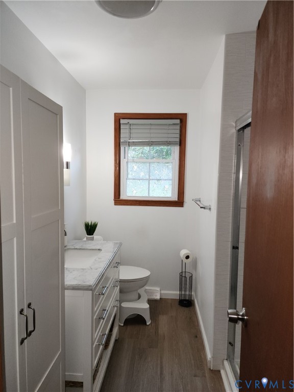5325 Meadoway Road Richmond, VA 23234 - Photo 6 of 15 Full bathroom featuring dark wood-style floors, a