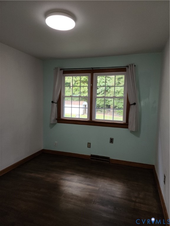 5325 Meadoway Road Richmond, VA 23234 - Photo 7 of 15 Unfurnished room with dark wood-style floors and p