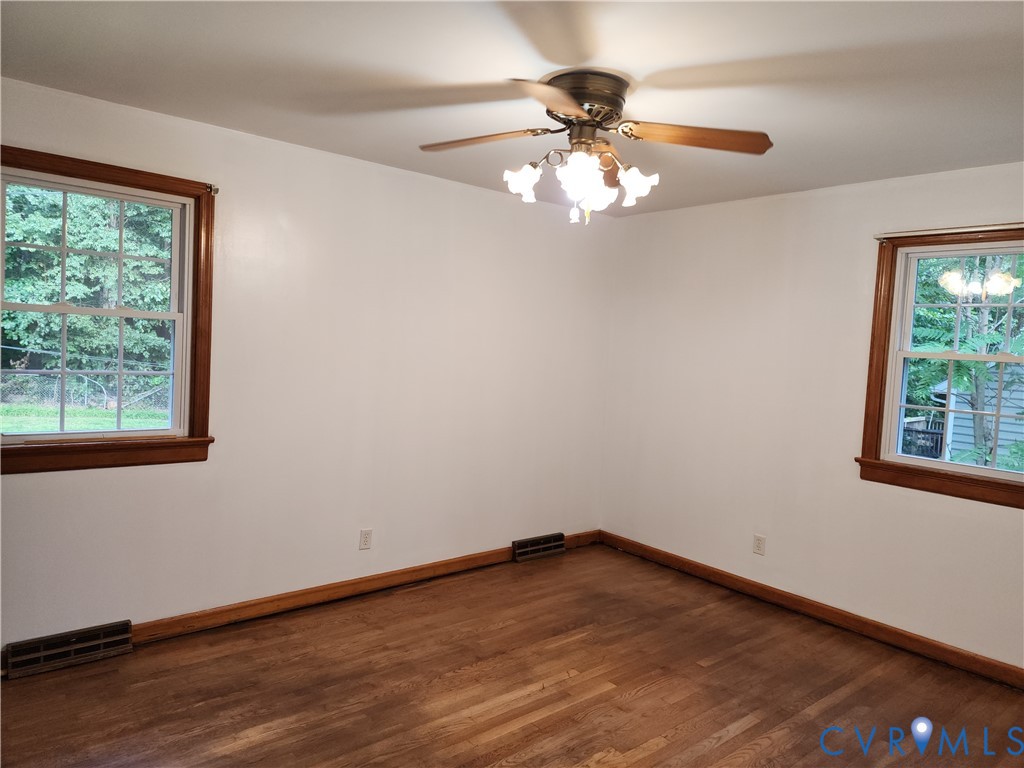 5325 Meadoway Road Richmond, VA 23234 - Photo 8 of 15 Unfurnished room featuring dark wood-style floors