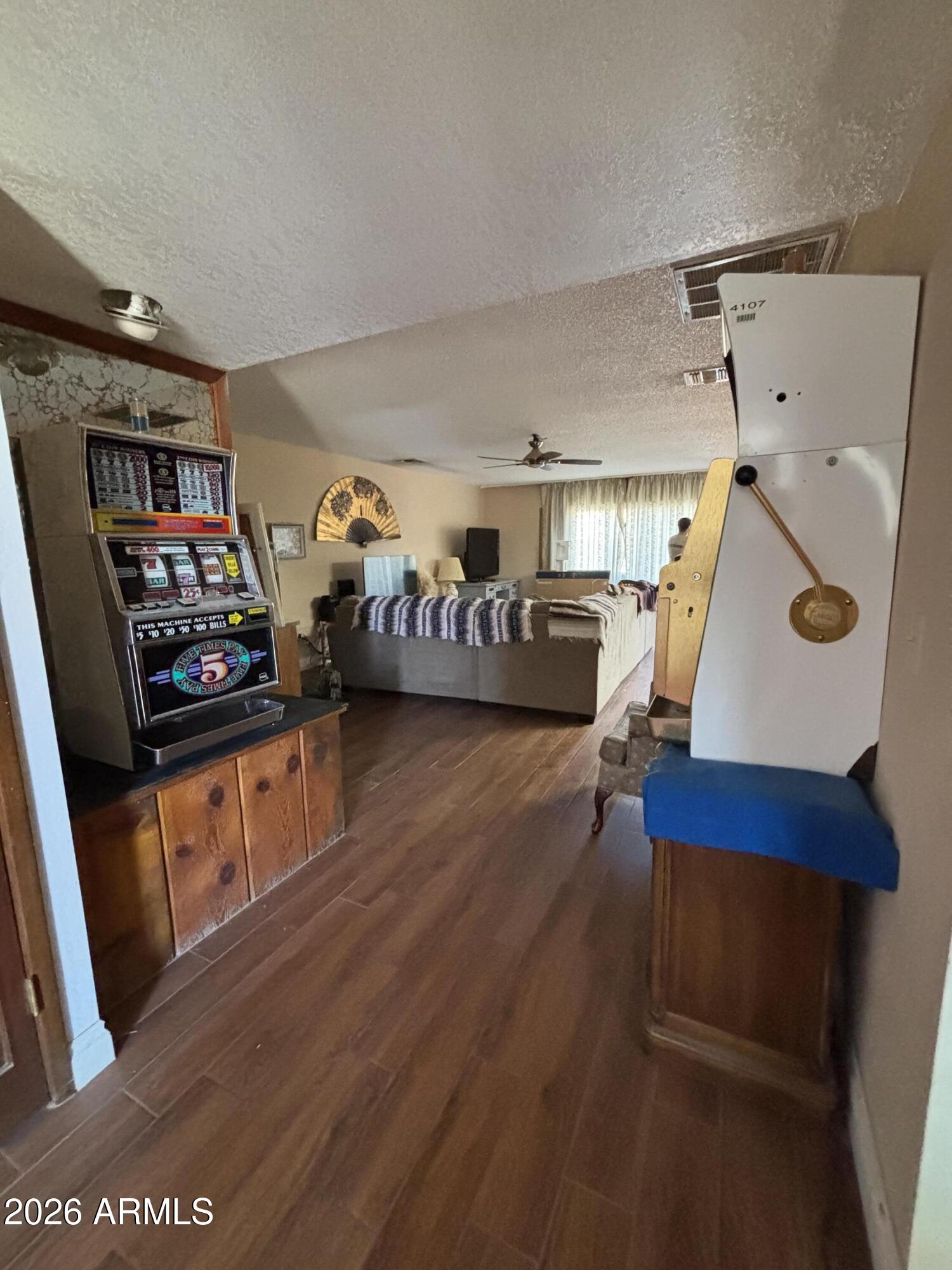 4934 West Fallen Leaf Lane Glendale, AZ 85310 - Photo 13 of 24 a living room with furniture and a wooden floor