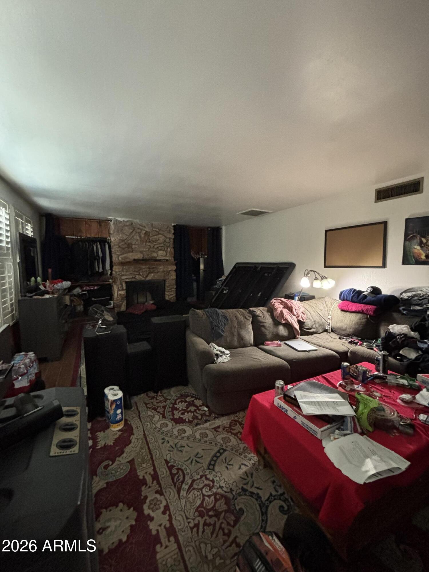 4934 West Fallen Leaf Lane Glendale, AZ 85310 - Photo 14 of 24 a bedroom with furniture and a wooden floor