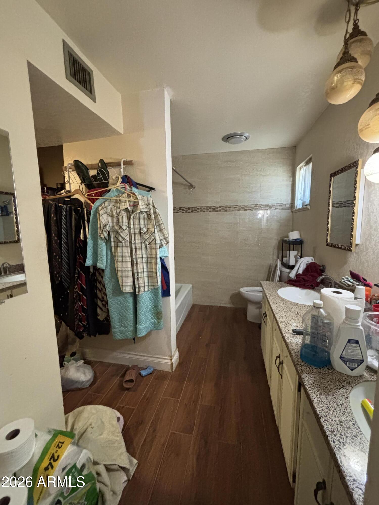 4934 West Fallen Leaf Lane Glendale, AZ 85310 - Photo 19 of 24 a kitchen with a refrigerator and a sink