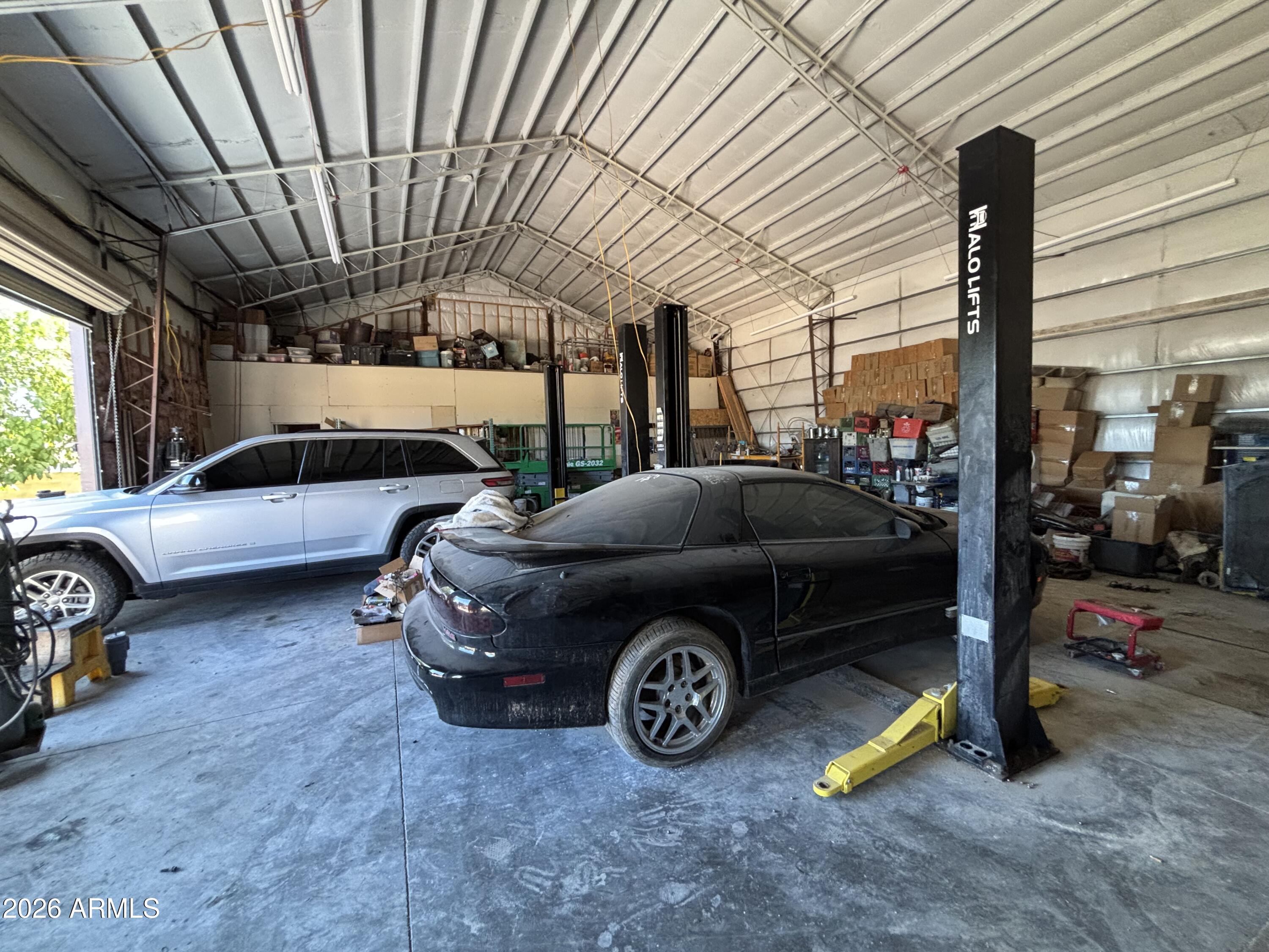 4934 West Fallen Leaf Lane Glendale, AZ 85310 - Photo 21 of 24 a car parked in a garage