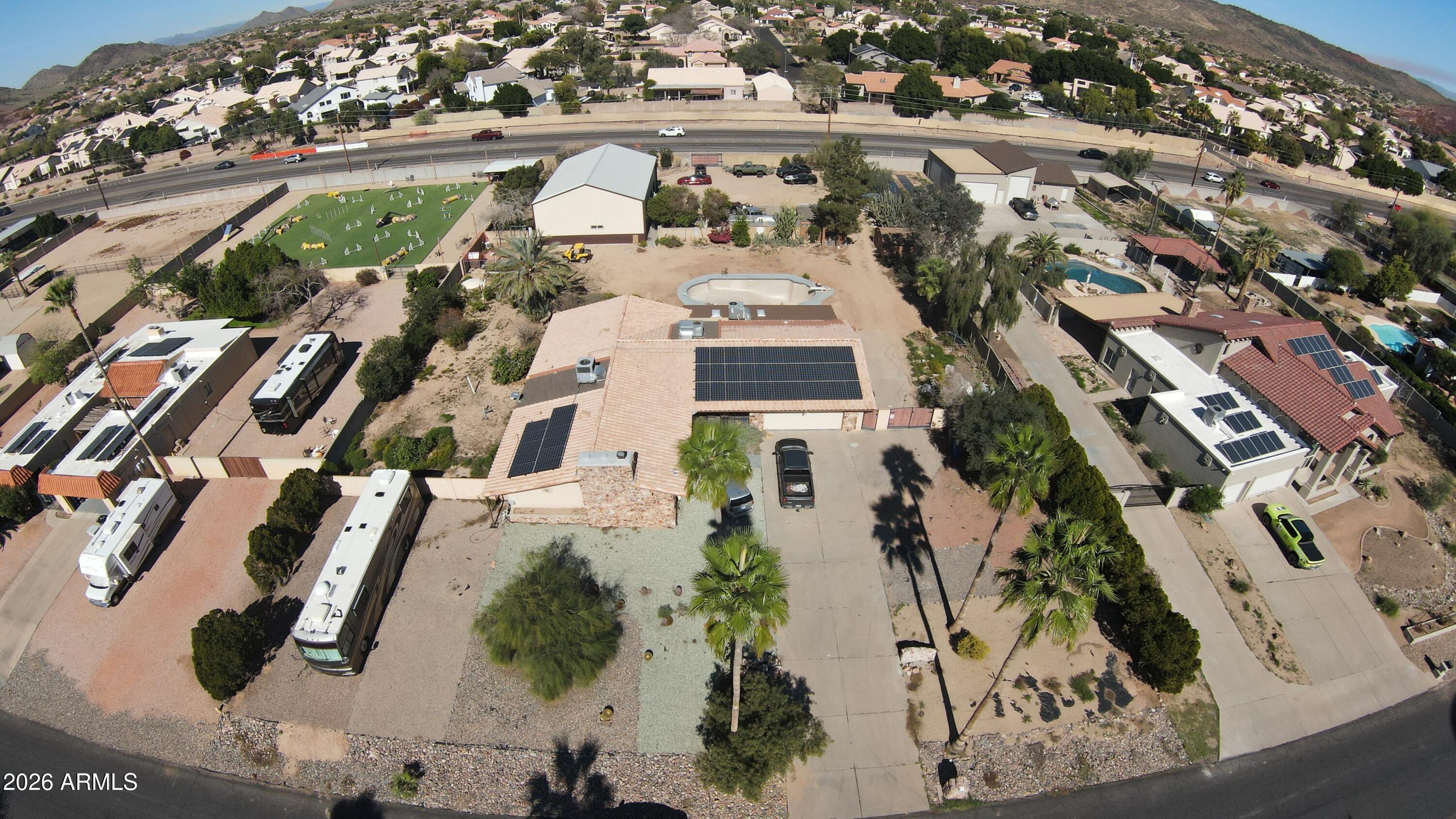 4934 West Fallen Leaf Lane Glendale, AZ 85310 - Photo 4 of 24 an aerial view of a house