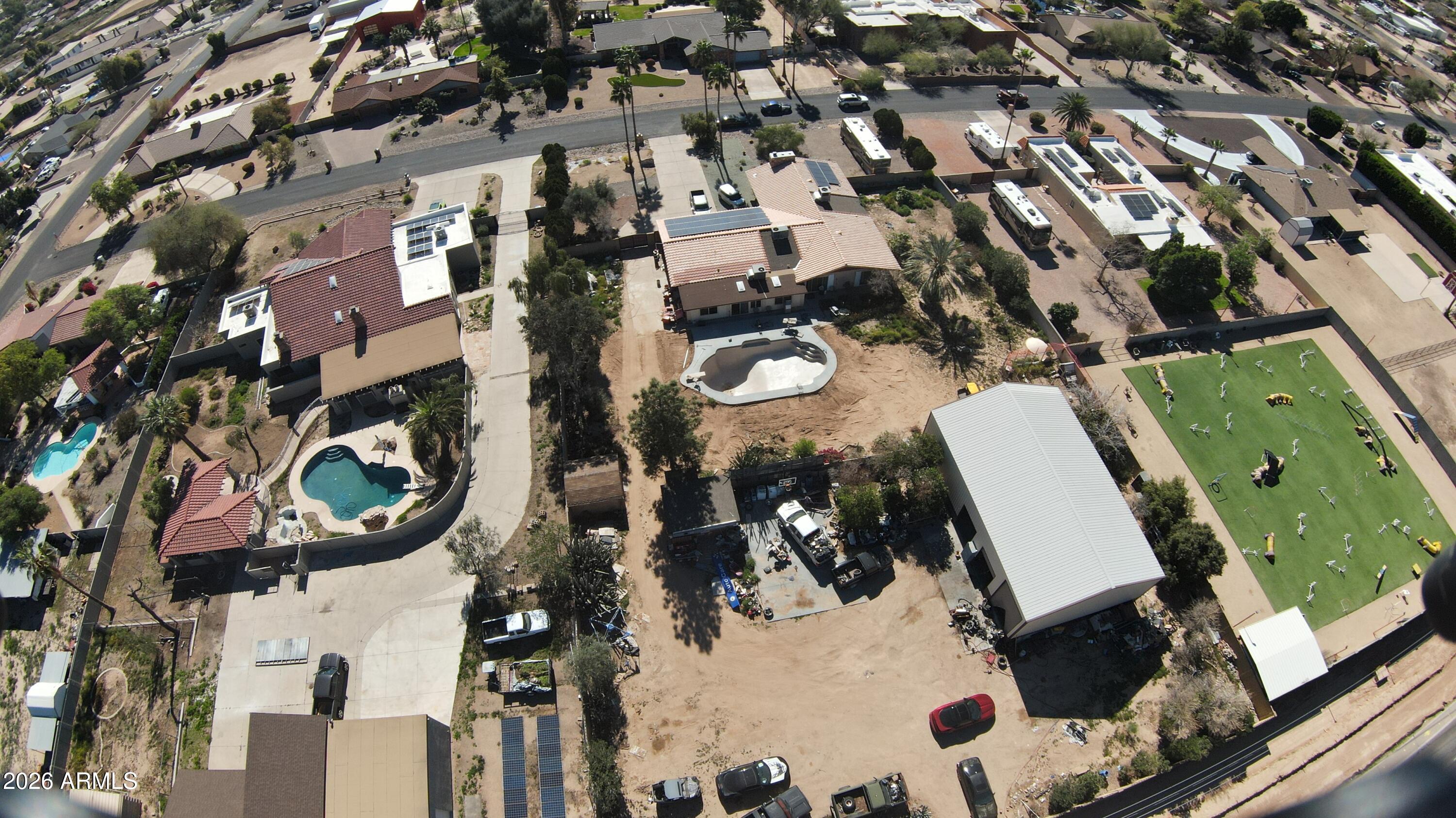4934 West Fallen Leaf Lane Glendale, AZ 85310 - Photo 7 of 24 an aerial view of a highlighted house