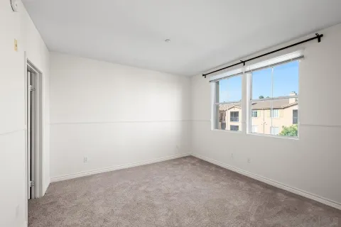 an empty room with windows