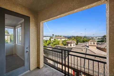 a view of balcony with furniture