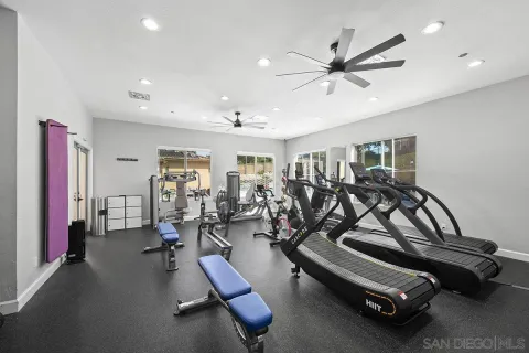 a view of a house with backyard porch and furniture