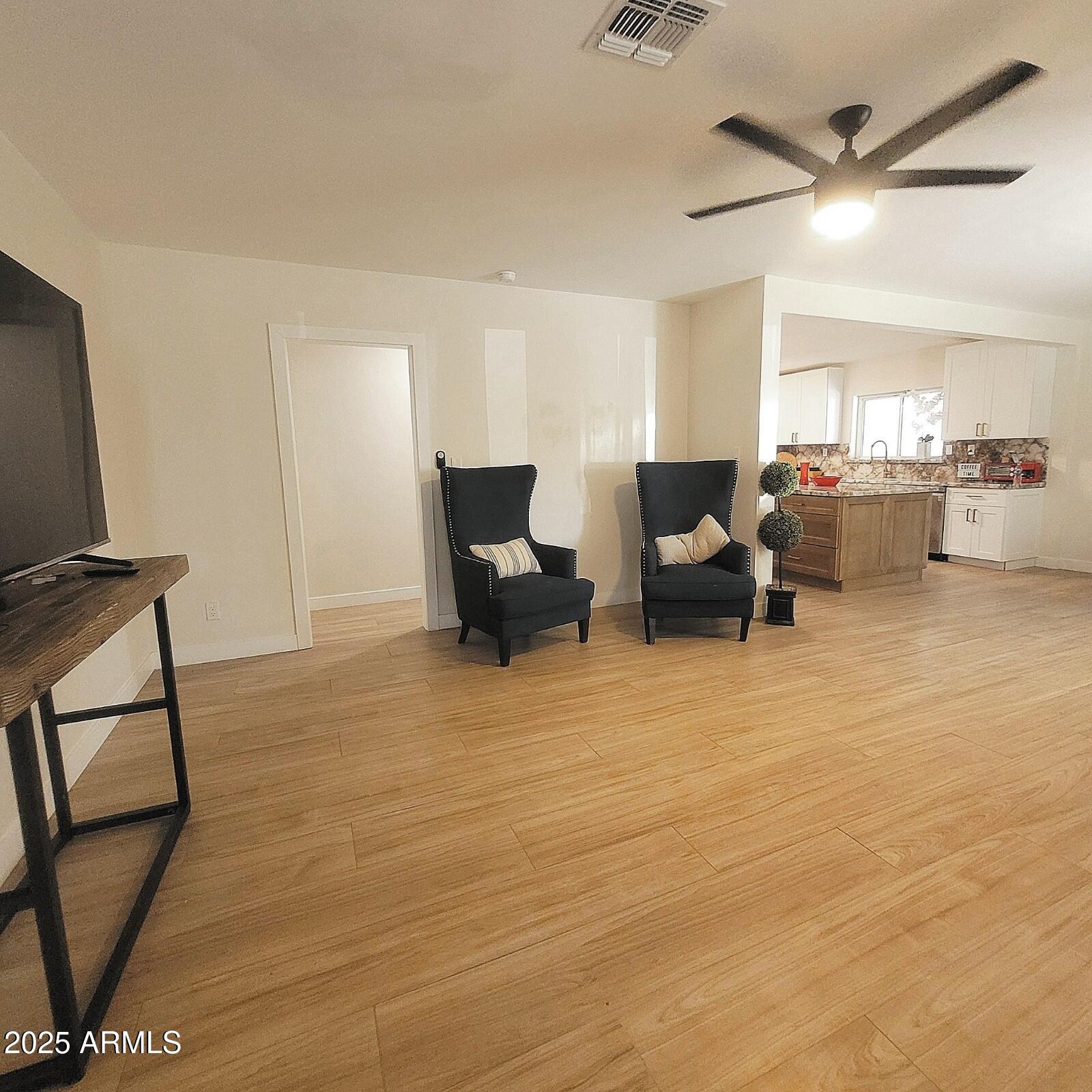 4028 East Edgemont Avenue Phoenix, AZ 85018 - Photo 13 of 27 a living room with furniture