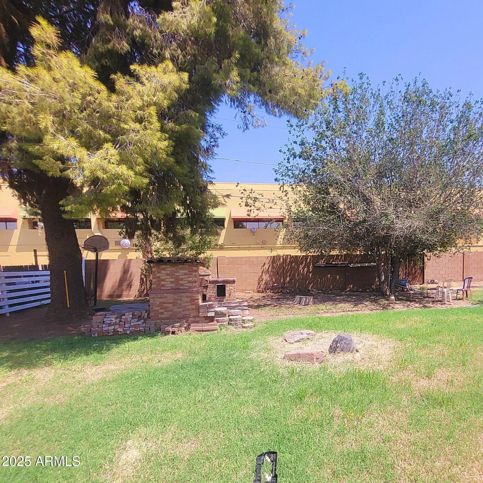 4028 East Edgemont Avenue Phoenix, AZ 85018 - Photo 27 of 27 a view of a backyard with swimming pool