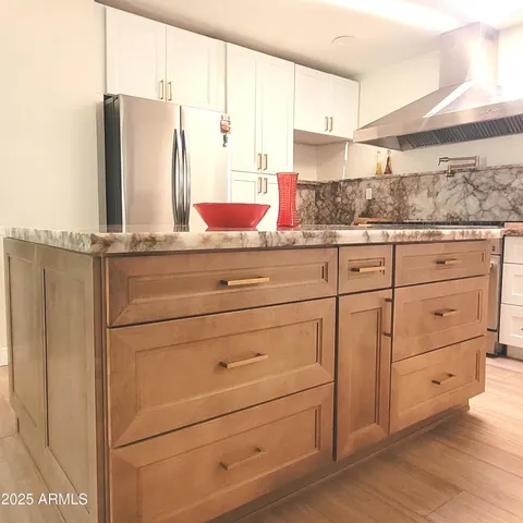 a view with cabinets and window