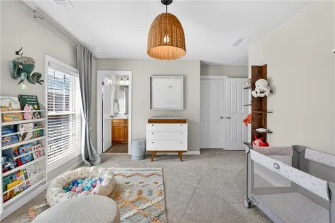 a room with toys and dresser