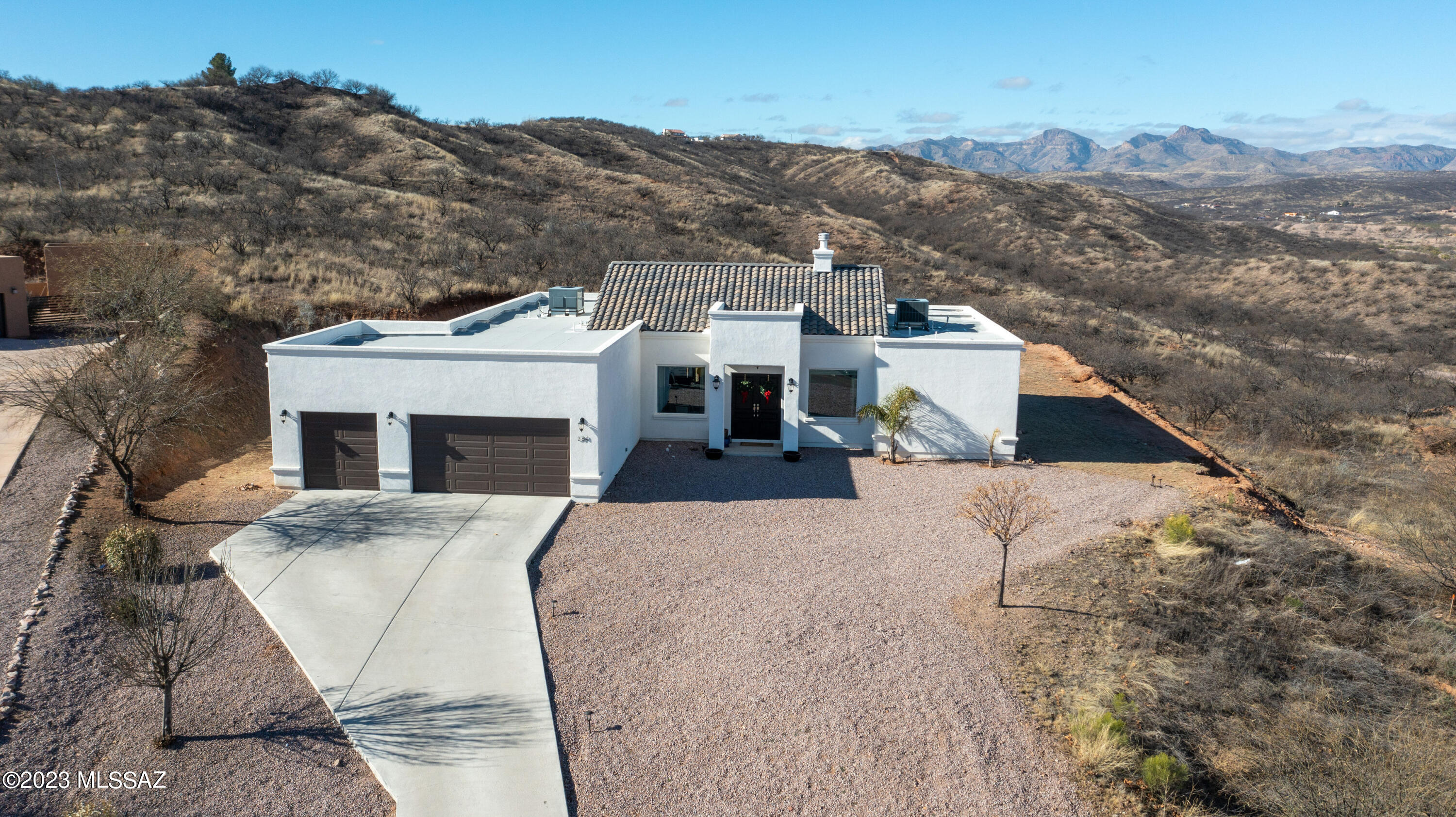 384 Via Estrella Vista Rio Rico, AZ 85648 - Photo 1 of 32 a view of a house with a mountain