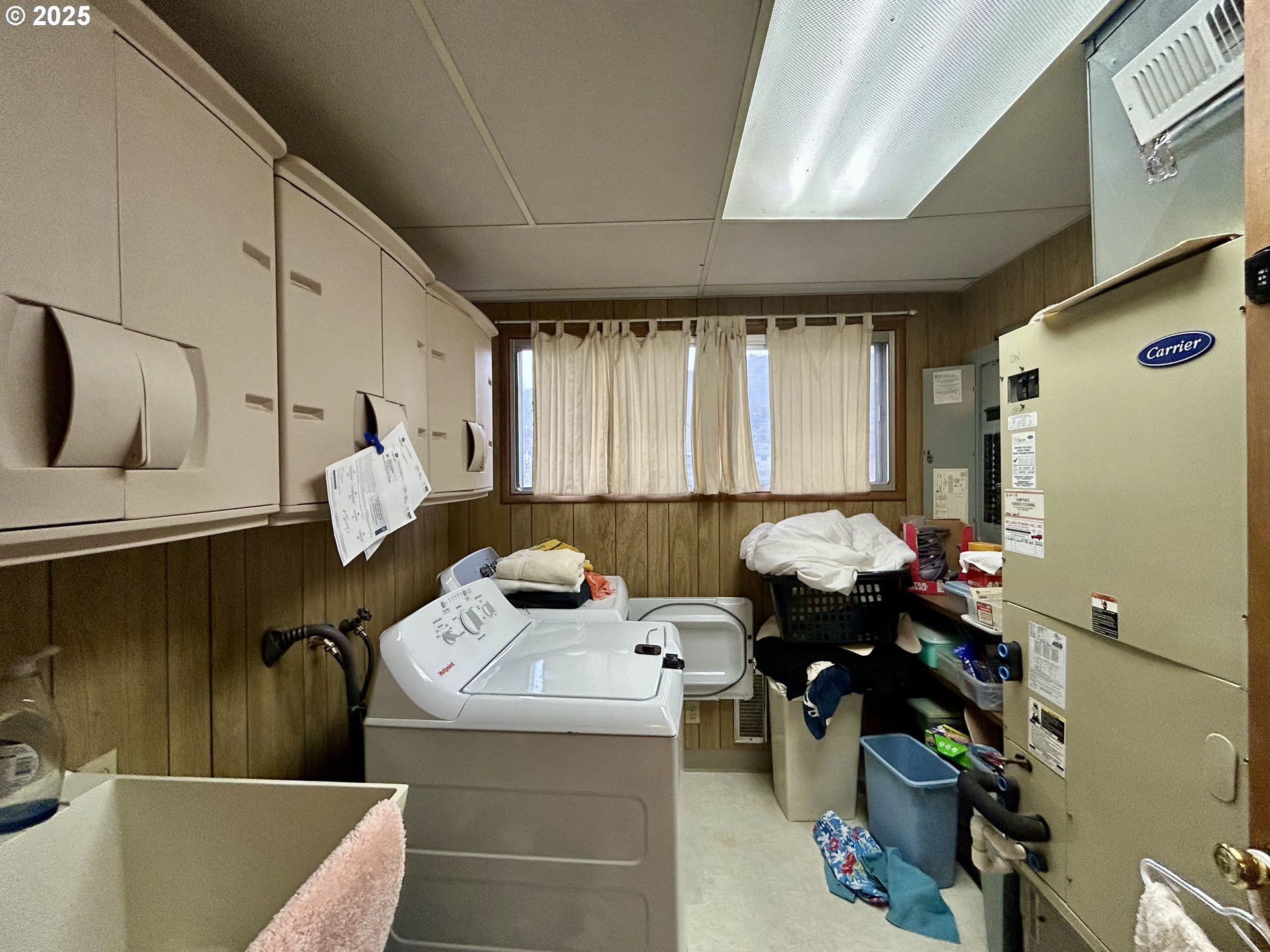 917 Myrtle Street The Dalles, OR 97058 - Photo 20 of 22 a kitchen with a sink appliances and cabinets
