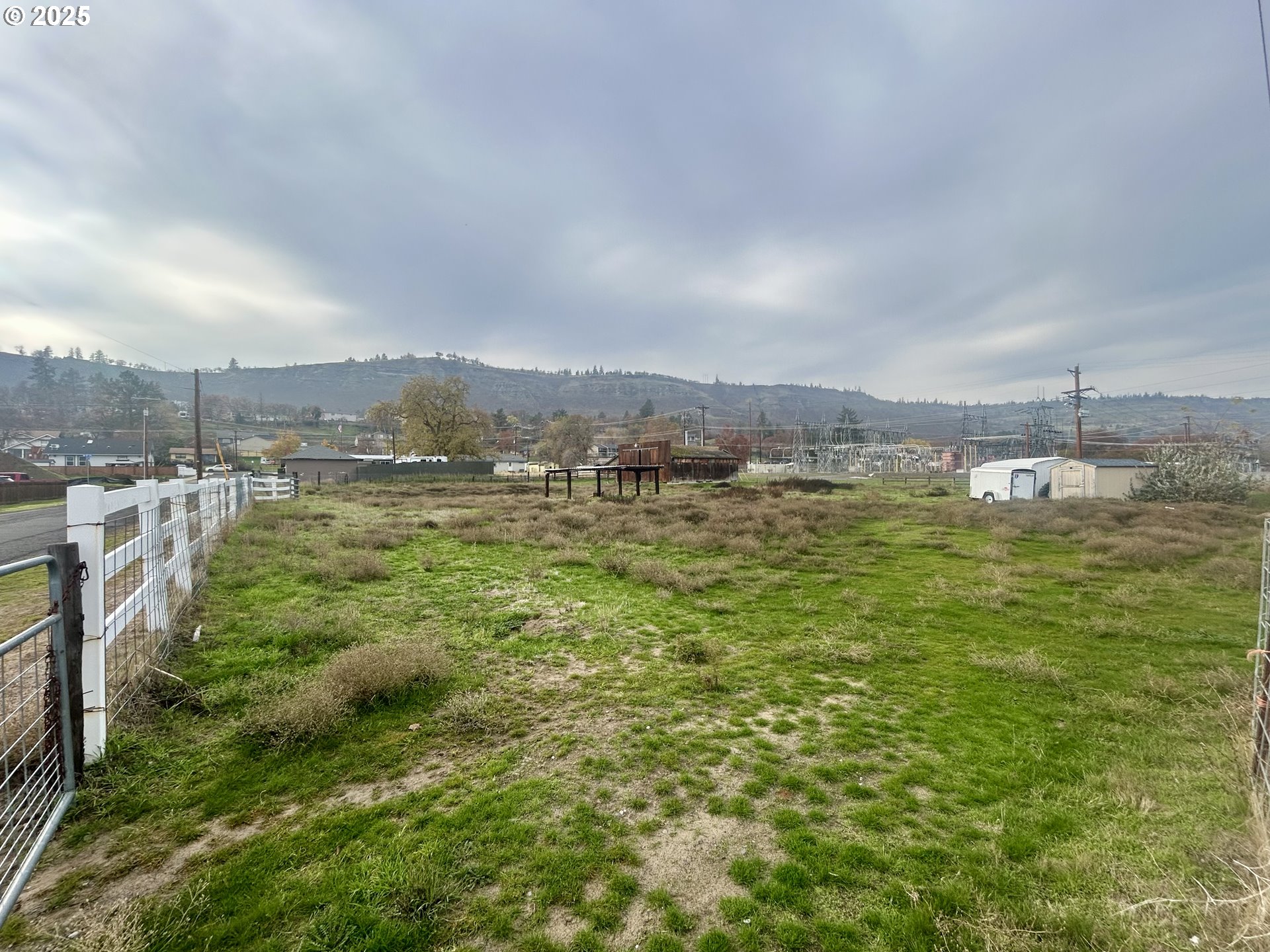 917 Myrtle Street The Dalles, OR 97058 - Photo 6 of 22 a view of a lake with houses in the back