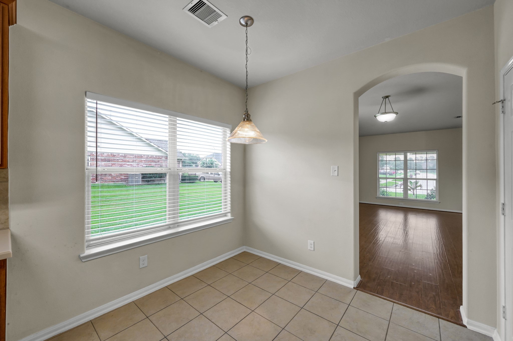 631 Timberstand Lane Spring, TX 77373 - Photo 18 of 38 The breakfast area offers a comfortable space for everyday meals with natural light and easy access to the kitchen, living room, and den.