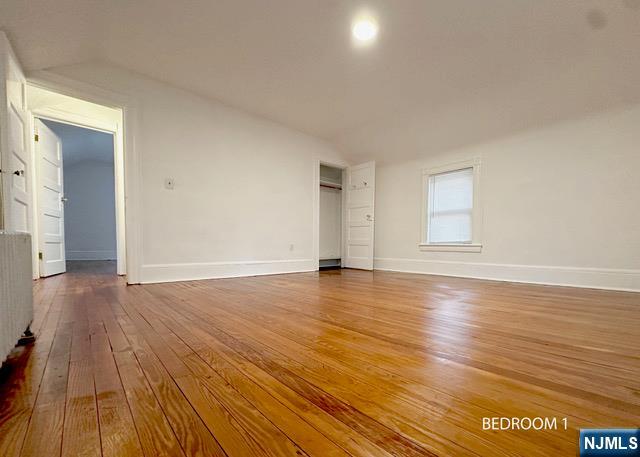 1156 High Mountain Road North Haledon, NJ 07508 - Photo 10 of 14 a view of empty room with wooden floor and fan