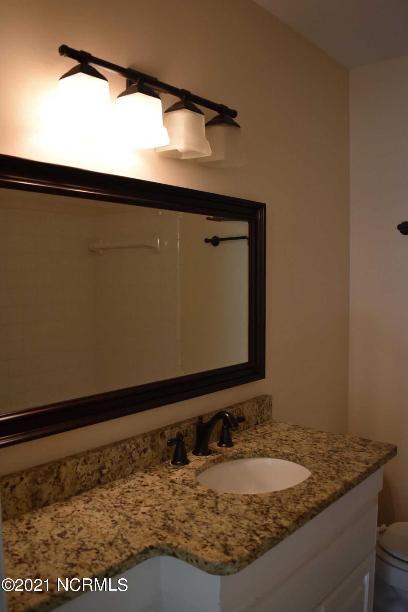 1222 Buxton Road Northwest Wilson, NC 27896 - Photo 13 of 25 hall bathroom