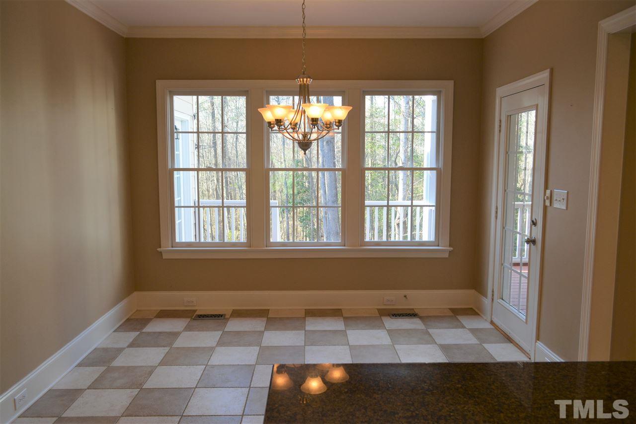 1316 Wynncrest Court Raleigh, NC 27603 - Photo 12 of 30 a view of an empty room with a window
