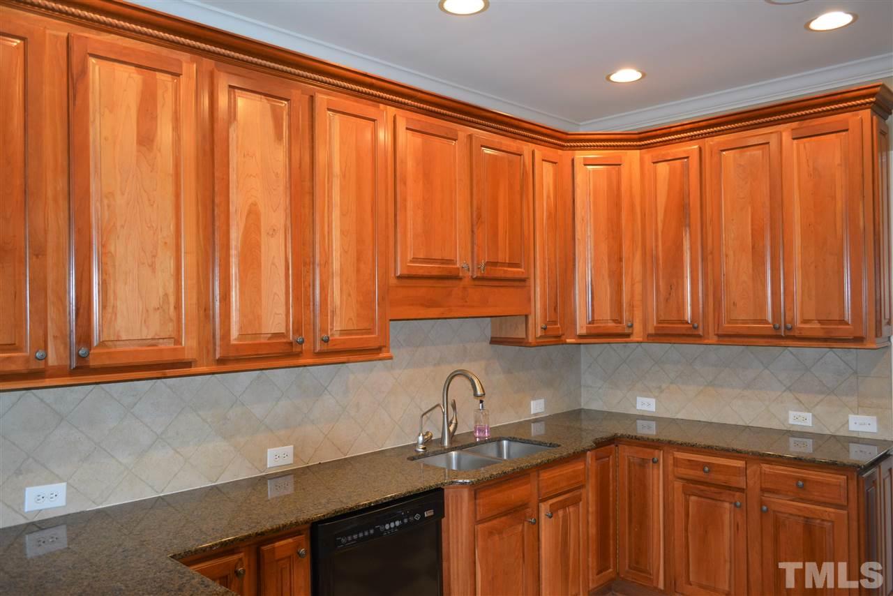 1316 Wynncrest Court Raleigh, NC 27603 - Photo 13 of 30 a view of a kitchen with sink and cabinets