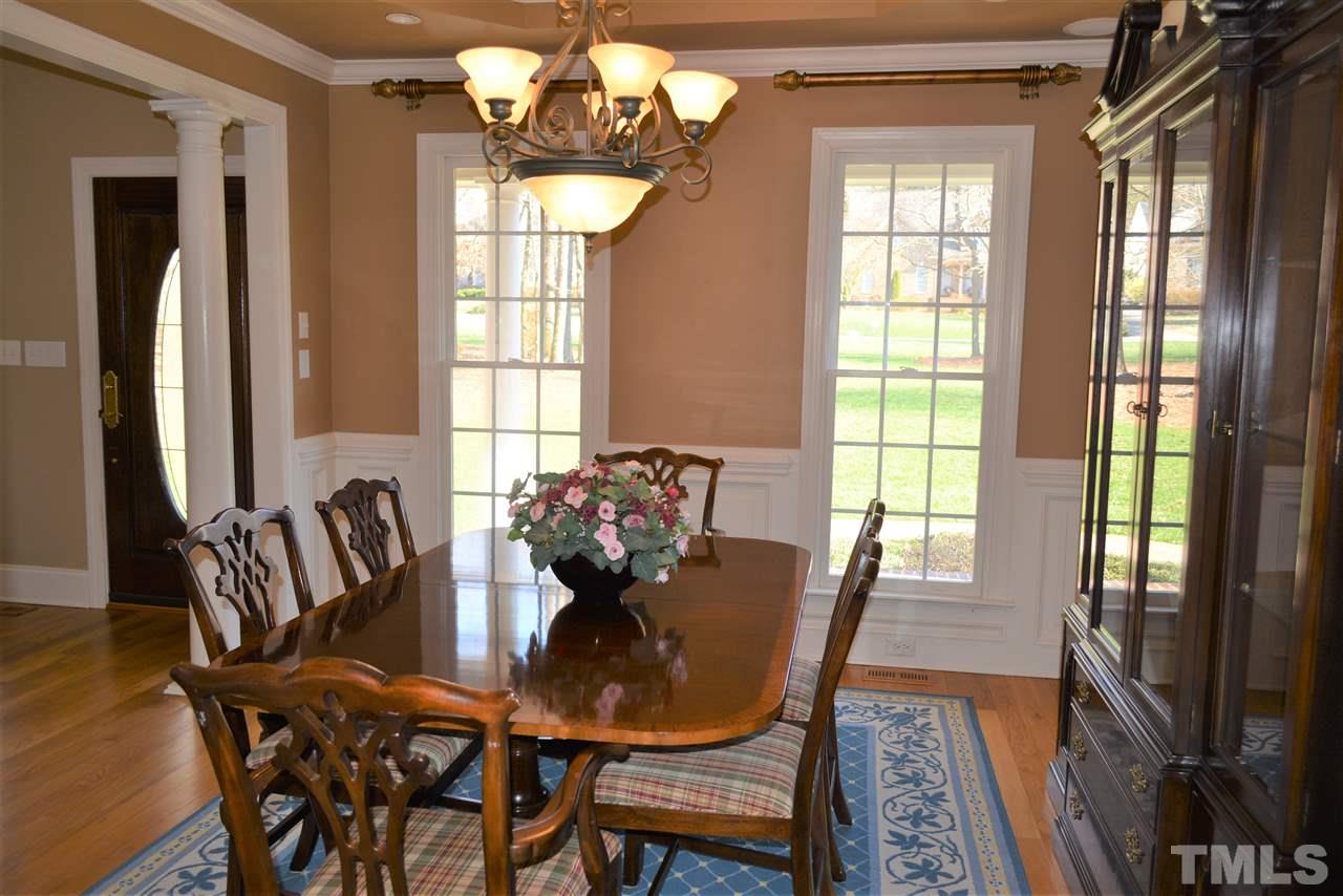 1316 Wynncrest Court Raleigh, NC 27603 - Photo 14 of 30 a view of a dining room with furniture window and outside view