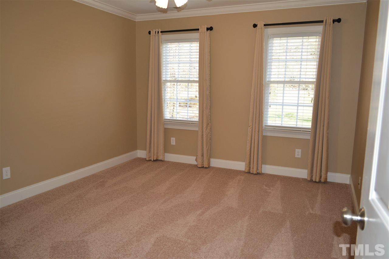 1316 Wynncrest Court Raleigh, NC 27603 - Photo 20 of 30 an empty room with windows