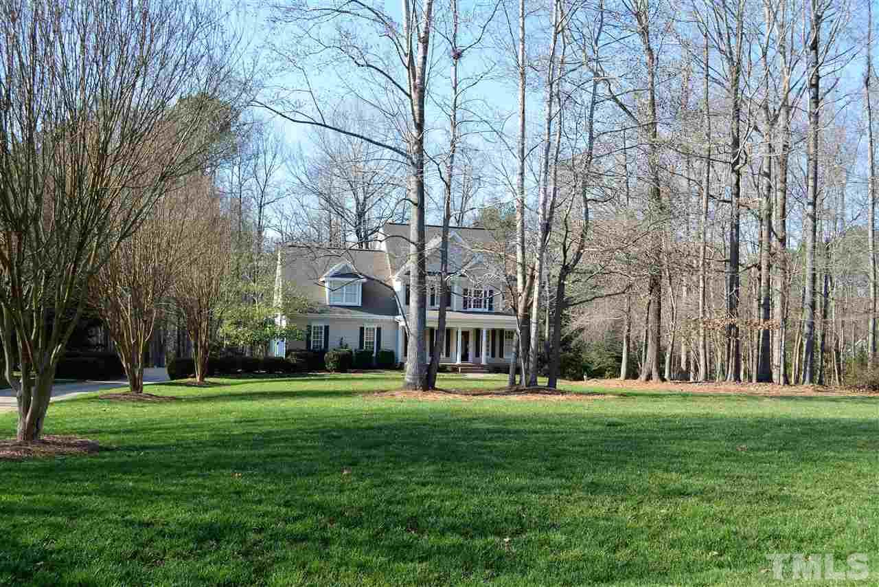 1316 Wynncrest Court Raleigh, NC 27603 - Photo 3 of 30 a garden view with trees