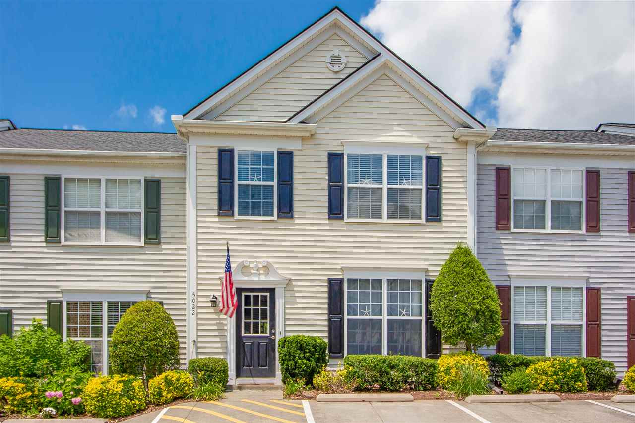 5022 Echo Ridge Road Raleigh, NC 27612 - Photo 1 of 22 a front view of a house with garden