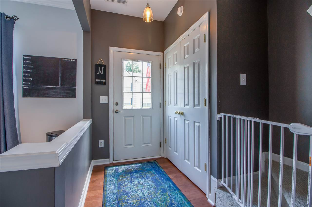 5022 Echo Ridge Road Raleigh, NC 27612 - Photo 20 of 22 a view of hallway with windows