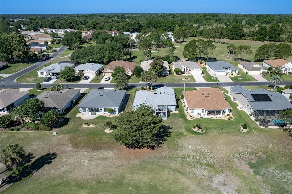 15143 Southwest 14th Avenue Road Ocala, FL 34473 - Photo 47 of 53 an aerial view of residential houses with outdoor space and street view
