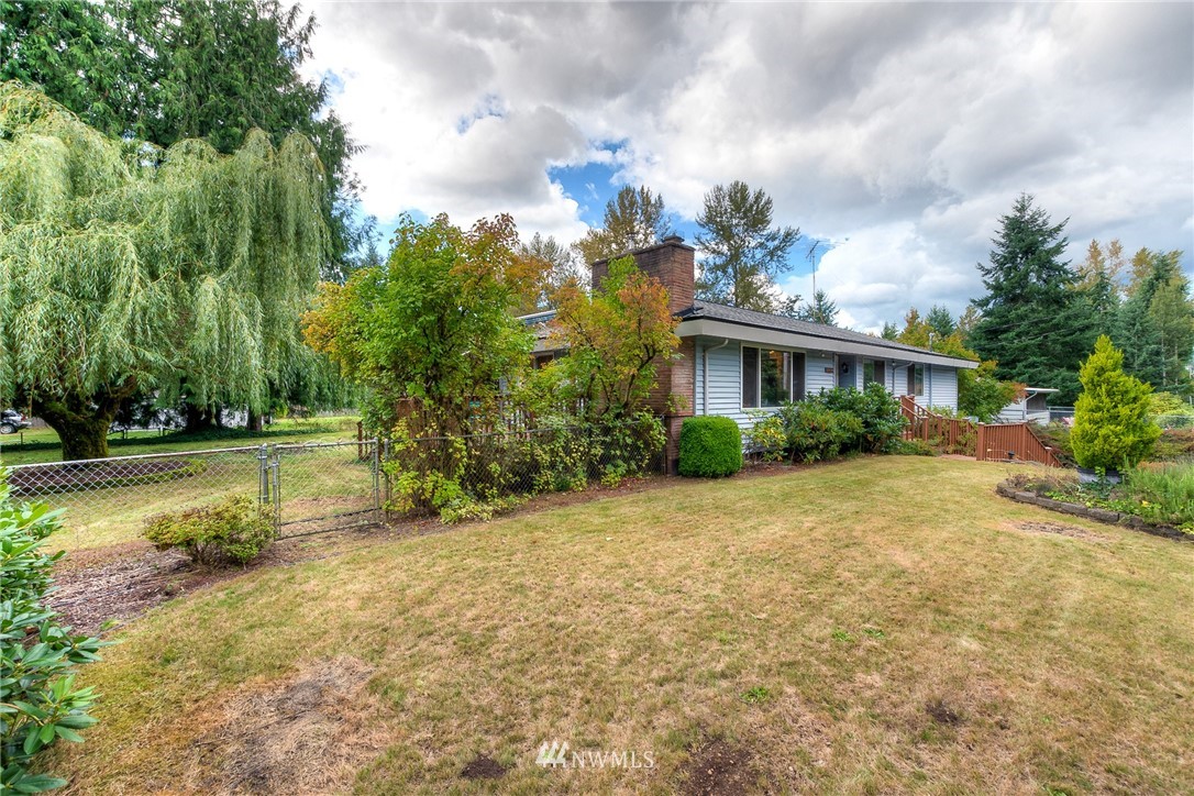 13453 Patriot Way Renton, WA 98059 - Photo 20 of 25 a view of a house with a yard