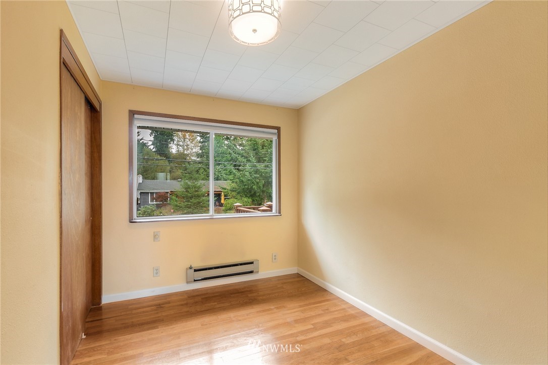 13453 Patriot Way Renton, WA 98059 - Photo 9 of 25 a view of an empty room with a window