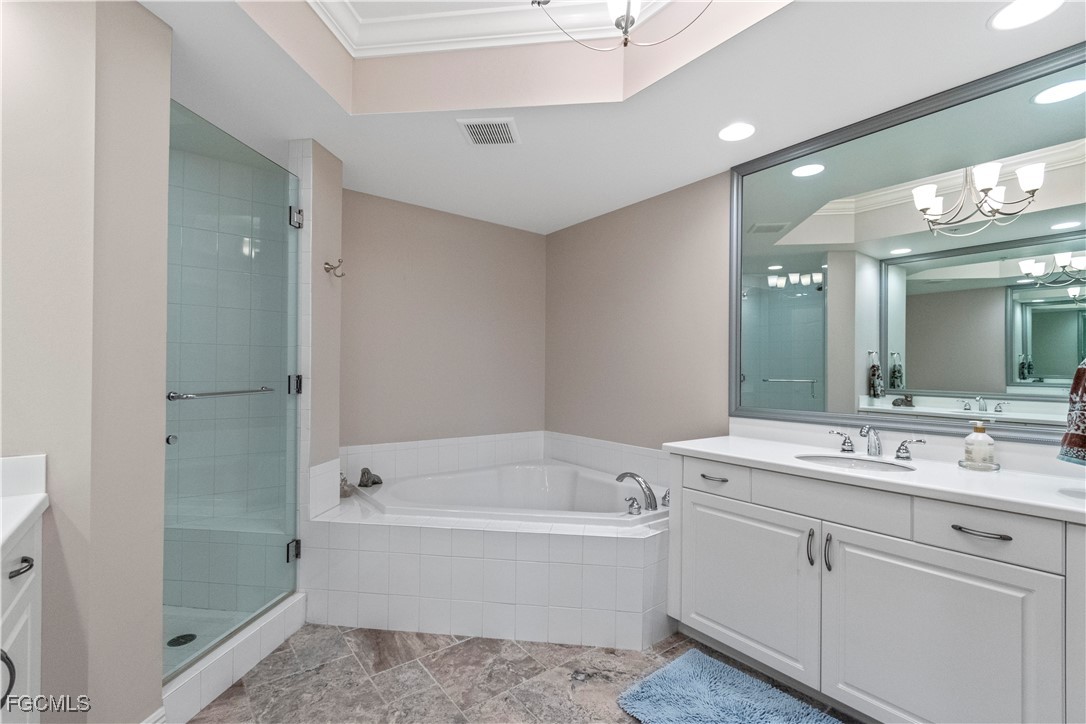 2090 West First Street, Unit I409 Fort Myers, FL 33901 - Photo 11 of 44 a bathroom with a bathtub and a sink