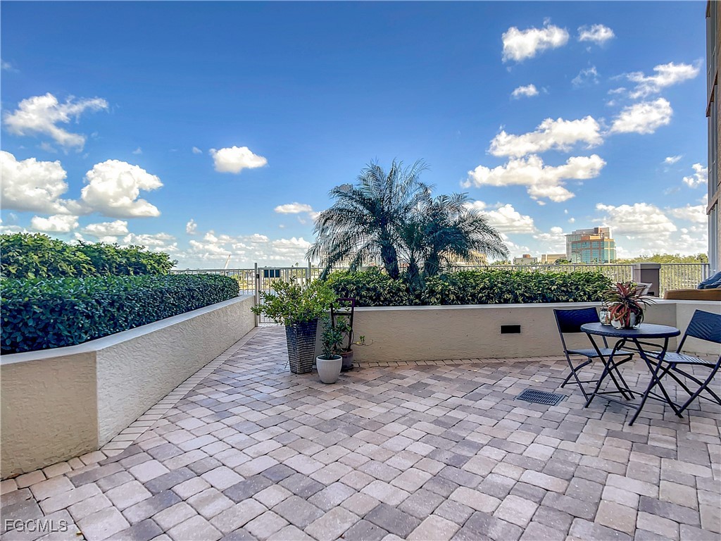 2090 West First Street, Unit I409 Fort Myers, FL 33901 - Photo 26 of 44 a view of a terrace with sitting area