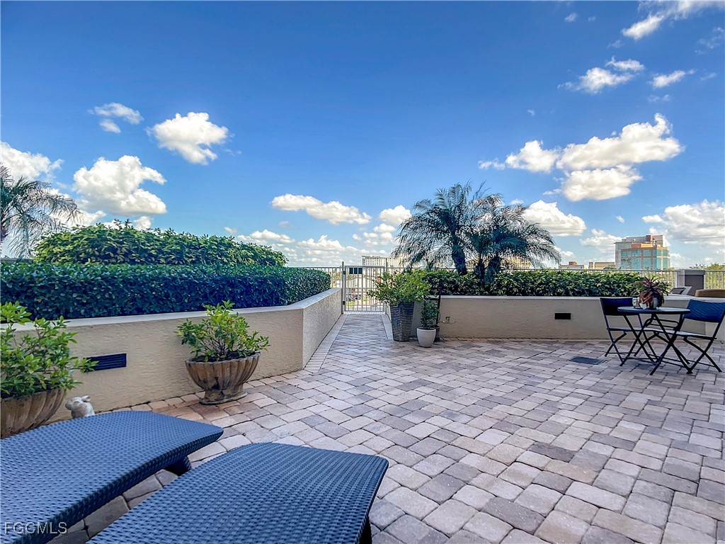 2090 West First Street, Unit I409 Fort Myers, FL 33901 - Photo 27 of 44 a view of a backyard