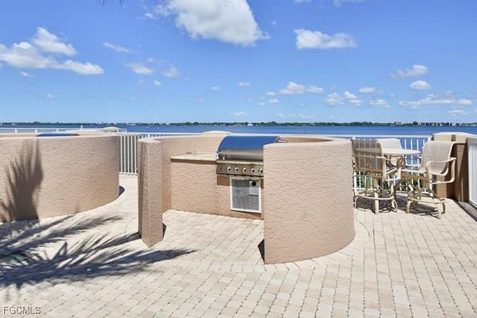 2090 West First Street, Unit I409 Fort Myers, FL 33901 - Photo 41 of 44 a view of a terrace with chairs
