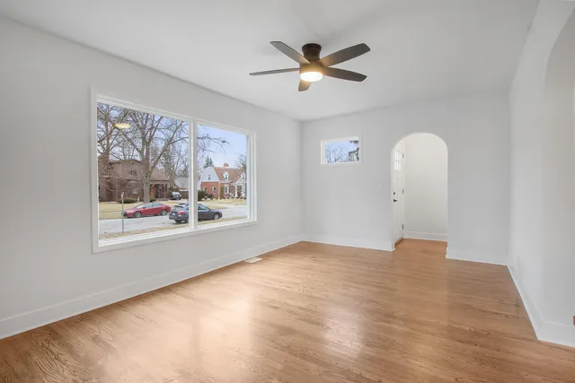 a view of an empty room with a window