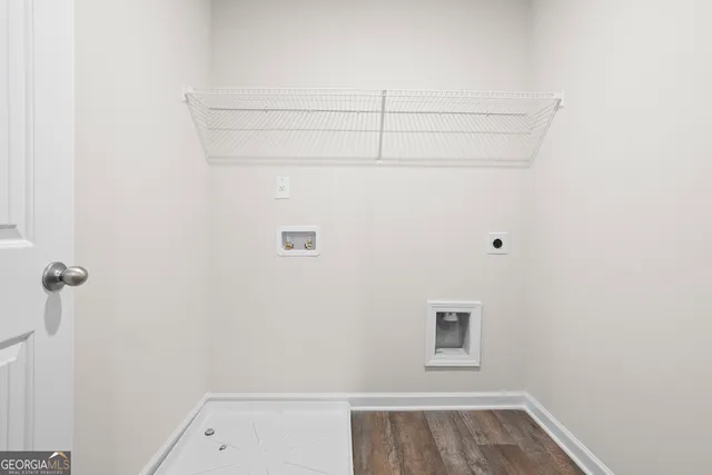 a view of a small space with racks on the wall