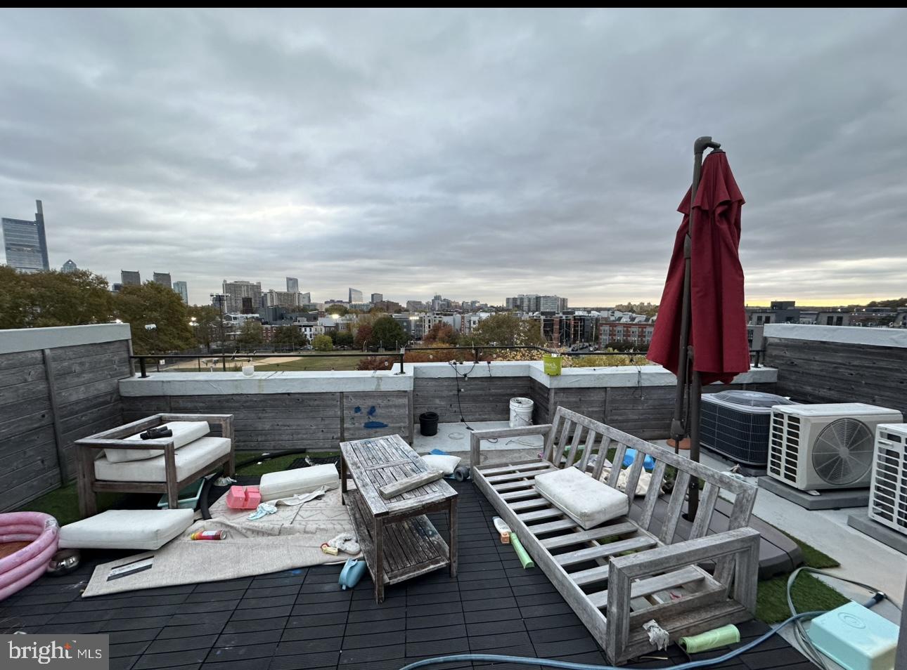 819 Cameron Street, Unit 1 Philadelphia, PA 19130 - Photo 21 of 22 a roof deck with couch and chairs