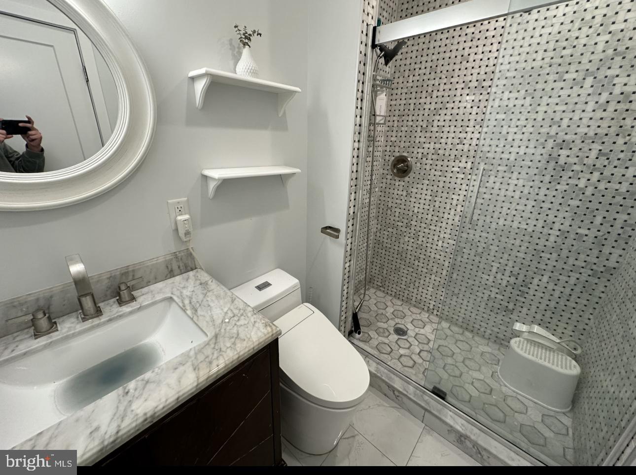 819 Cameron Street, Unit 1 Philadelphia, PA 19130 - Photo 8 of 22 a bathroom with a sink toilet and shower