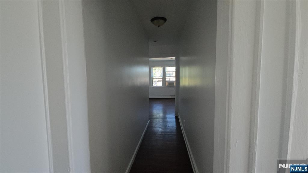 264-266 Pomona Avenue, Unit 3 Newark, NJ 07112 - Photo 17 of 27 a view of a hallway