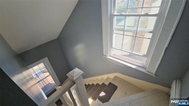 a view of an empty room and window