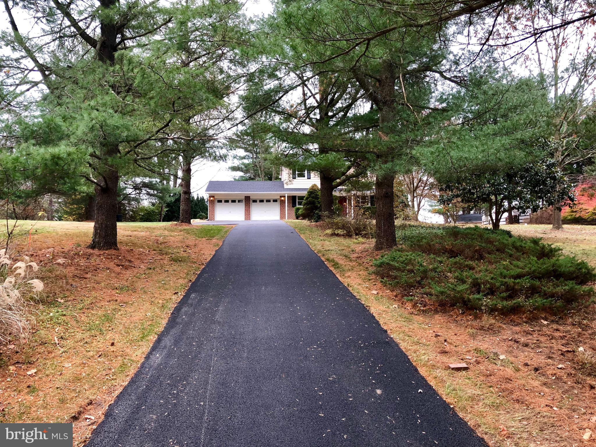 10919 Rawley Road New Market, MD 21774 - Photo 13 of 15 NEWLY PAVED DRIVEWAY, 2 CAR GARAGE W/OPENERS