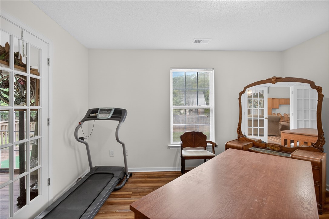 207 Hunters Lane Anderson, SC 29625 - Photo 26 of 46 This bedroom is currently set up as a home office and workout room.