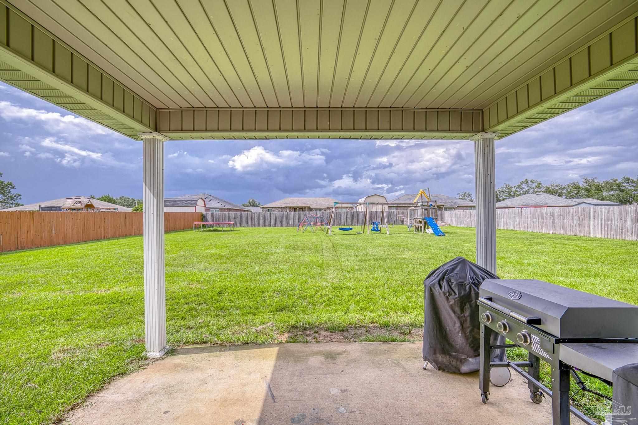4037 Millwright Way Pace, FL 32571 - Photo 39 of 46 a view of yard with green space