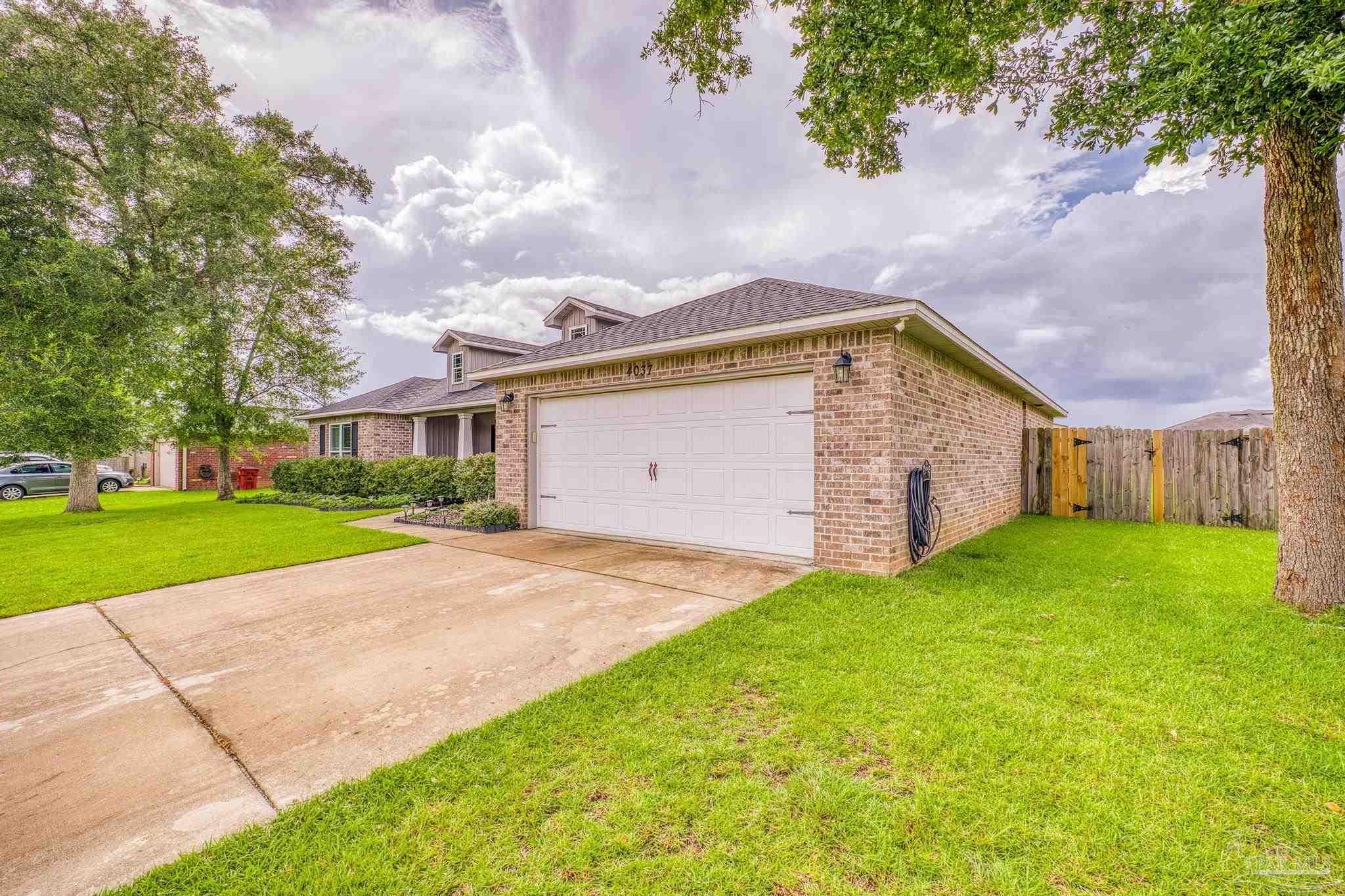 4037 Millwright Way Pace, FL 32571 - Photo 4 of 46 a view of outdoor space yard and house