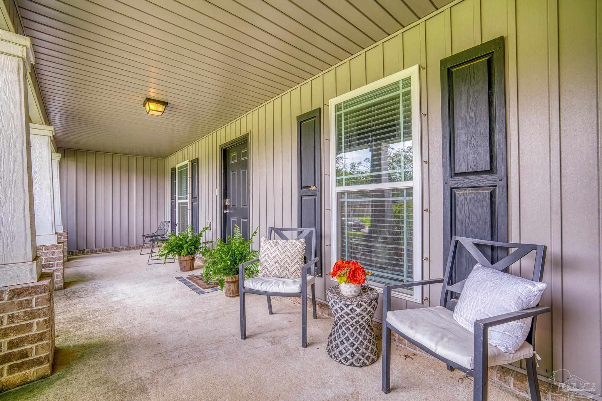 4037 Millwright Way Pace, FL 32571 - Photo 8 of 46 a view of an outdoor space with a patio