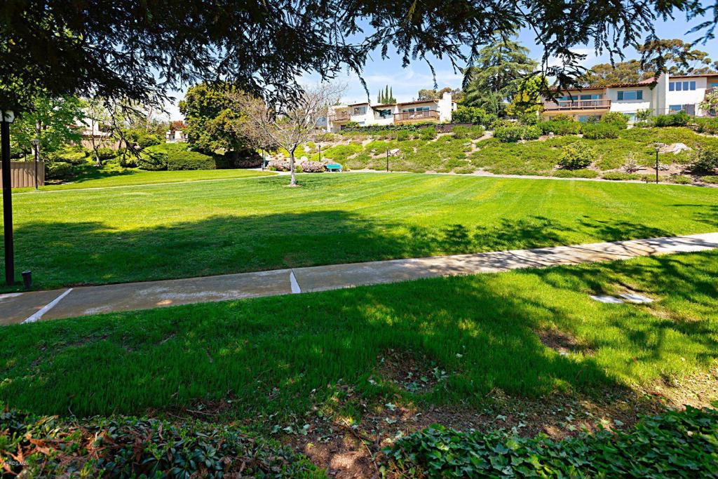 595 Racquet Club Lane Thousand Oaks, CA 91360 - Photo 23 of 23 a view of a golf course with a big yard