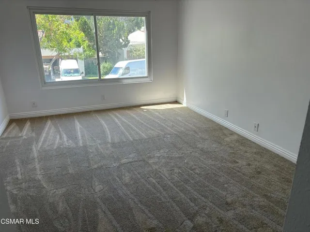 a view of a livingroom with a flat screen tv